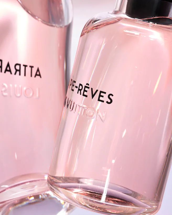 Close-up of Louis Vuitton Attrape-Rêves Eau de Parfum 100ml perfume bottle, a refined fragrance for ladies