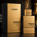 Al Haramain Amber Oud perfume bottle and packaging on a dark background