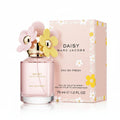 Marc Jacobs Daisy Eau So Fresh perfume bottle and packaging with floral design.