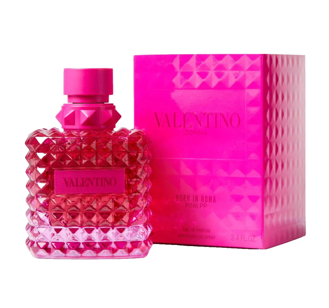 Valentino perfume bottle and packaging with pink design on a white background